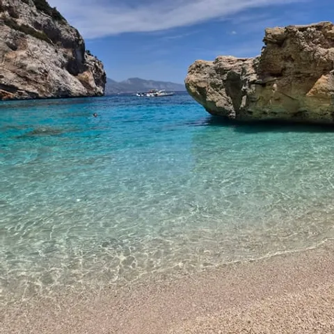 A cove with clear water on the Baunei coast